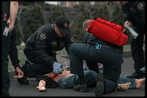 EMT's working on patient